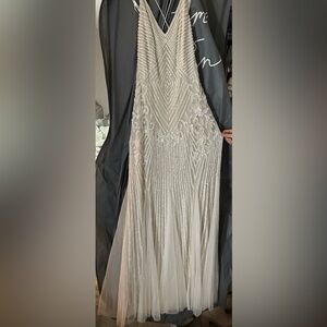 Brand new never worn David’s bridal wedding dress. Never taken out of dust bag